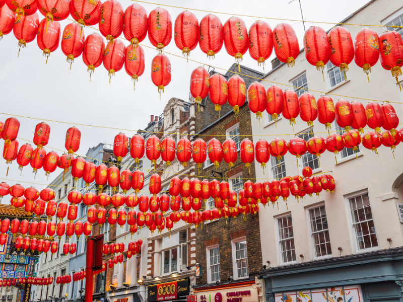 lantern hanging across the buildings
